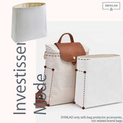 Franchement ? Mon sac à dos de luxe méritait mieux – ce insert en Dupont a tout changé